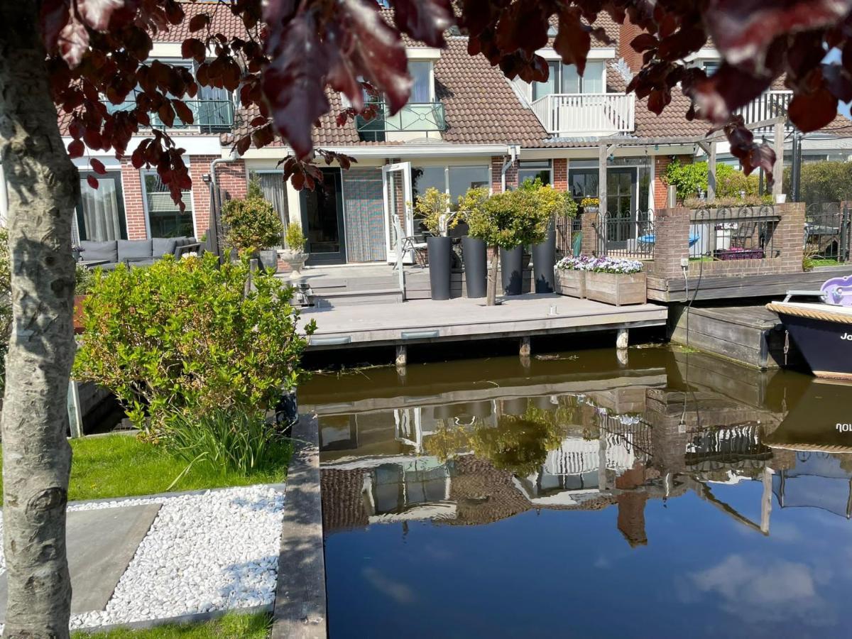 Guesthouse Bednboot Met Terras Aan Het Water Rijpwetering Luaran gambar