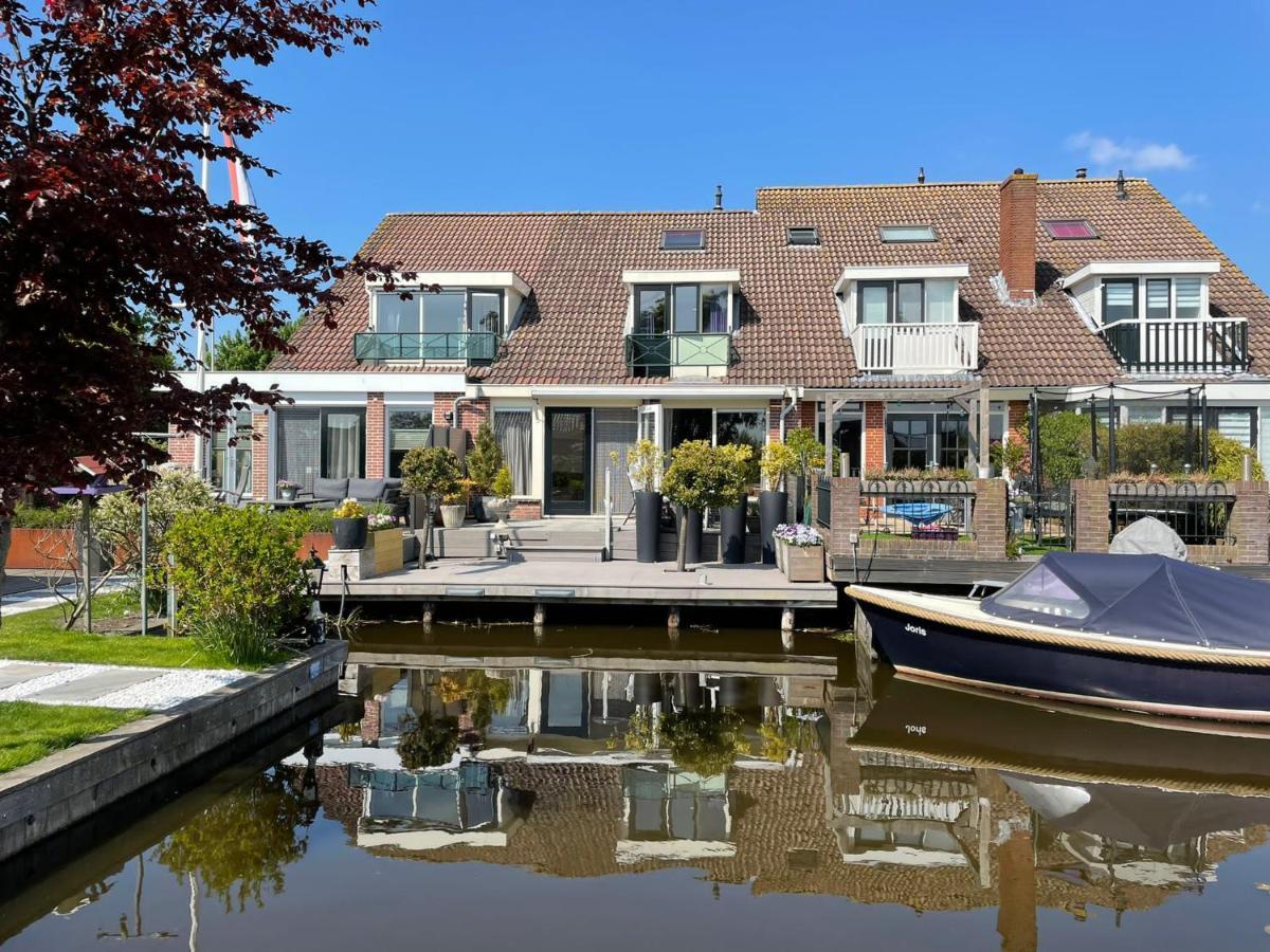 Guesthouse Bednboot Met Terras Aan Het Water Rijpwetering Luaran gambar